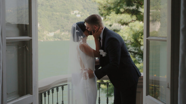 Bobbi and George kissing at an open balcony over Lake Como, Relais Villa Vittoria, Gaetano Di Giacomo Media Production