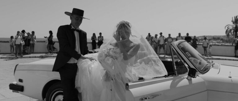 A bride and groom with a vintage car on the coast, from a wedding at Villa Almanita, Spain, Gaetano Di Giacomo Media Production
