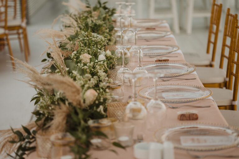 Long table with a garland of greenery and pampas grass, Galu Seaside