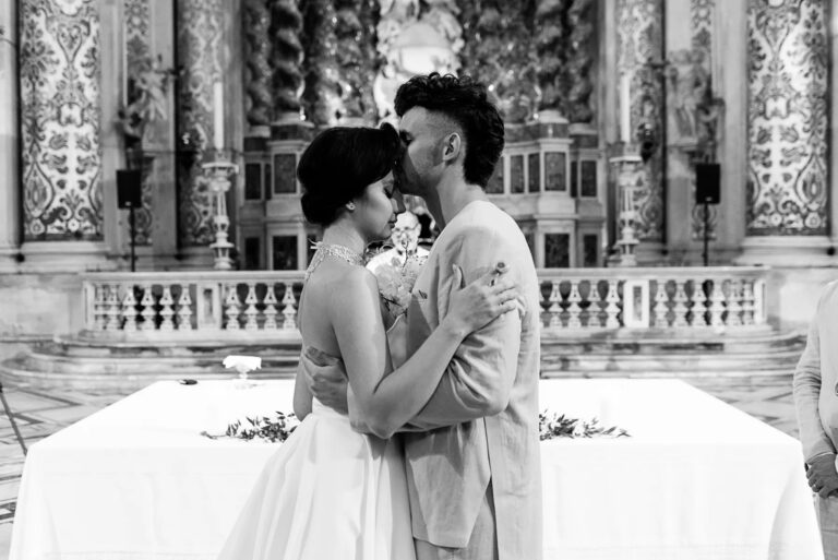 Couple in a black and white portrait inside an ornate hall, Geta Ungurean Agency