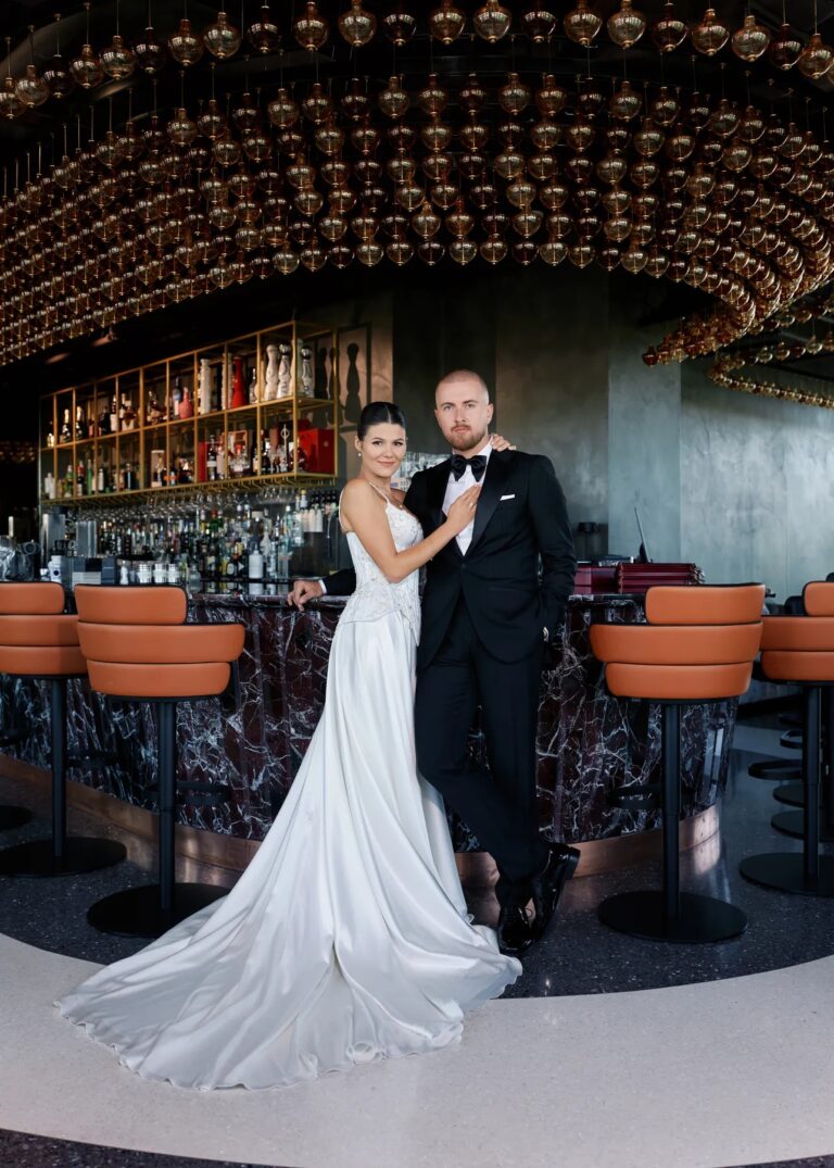 Couple in a copper-toned cocktail bar, Geta Ungurean Agency