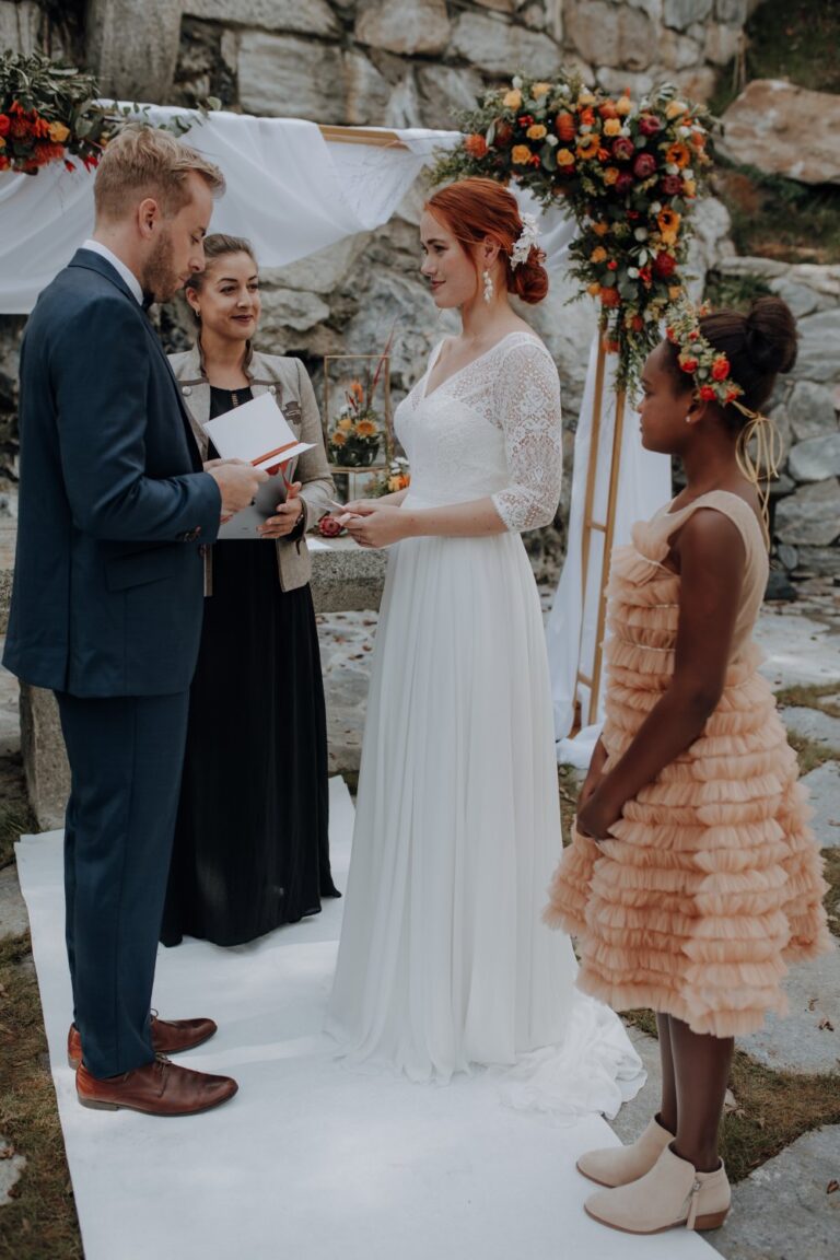 Ceremony beneath a floral arch in the castle grounds, Schloss Mittersill, Getting Married In Austria