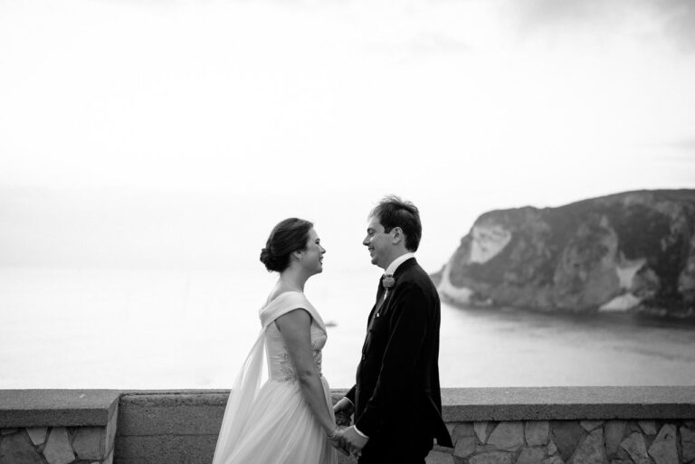 A couple on a terrace above the sea cliffs of Ponza, in black and white, Giandomenico Cosentino Photography