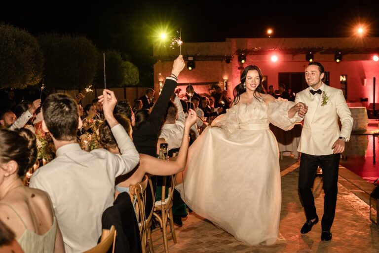 Bride and groom dancing into dinner among their guests at Le Palais Paysan, Marrakech, Giandomenico Cosentino Photography