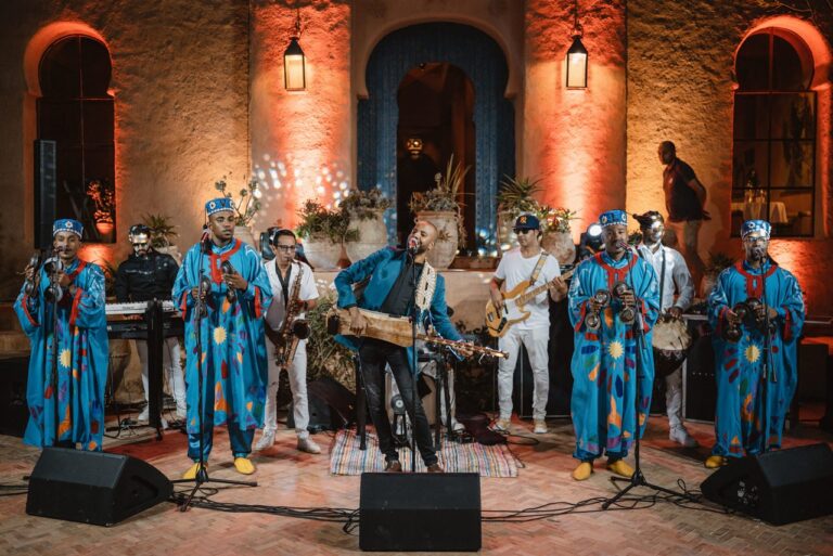 Musicians in blue robes playing for the guests at Le Jardin des Douars, Essaouira, Giandomenico Cosentino Photography