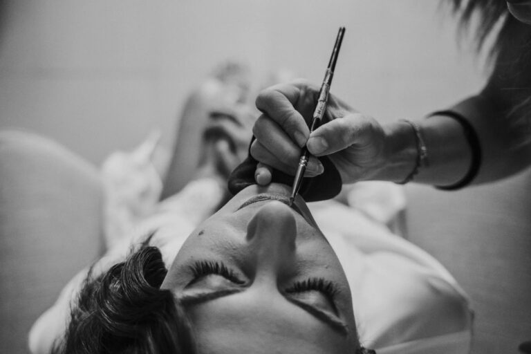 Make-up being applied on the wedding morning, in black and white, Puglia, Giuseppe Suma Weddings
