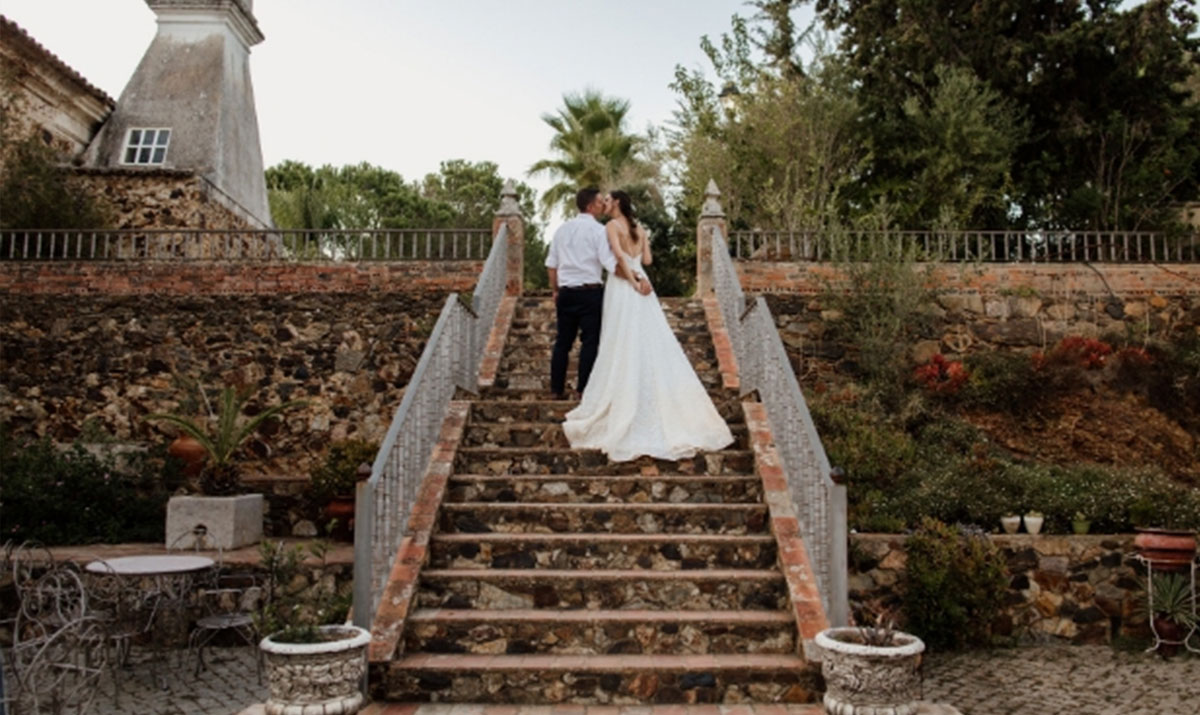 Couple at the top of a garden staircase at a quinta, Glamour Algarve Weddings