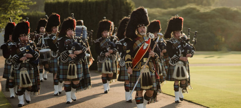 Pipers marching on the lawn, Gleneagles