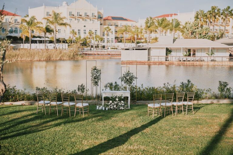 Lakeside ceremony set-up with seating and ceremony table at Domes Lake Resort, Go2Wonderland