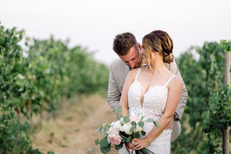 Couple embrace among the vines, Go2Wonderland