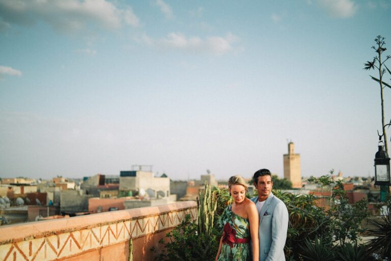 A couple on a rooftop terrace overlooking the city, Morocco, Gordon Wedding Films