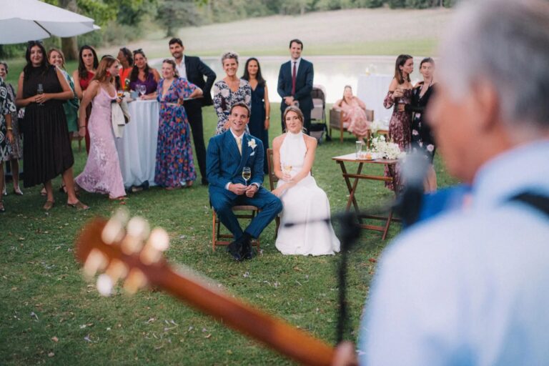 The couple and guests listening to live music on the lawn, Château de Valmousse, Provence, Gordon Wedding Films