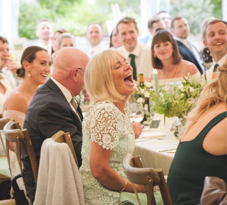Guests laughing at the speeches during the wedding breakfast, Gorgeous Films