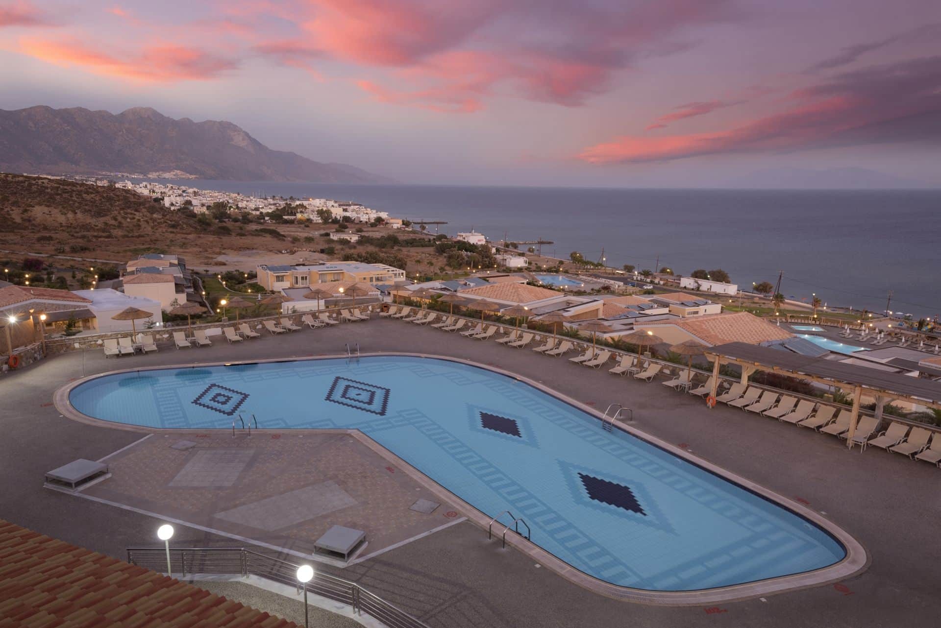 The main pool at sunset with the mountains behind, Grand Blue Kos Hotel