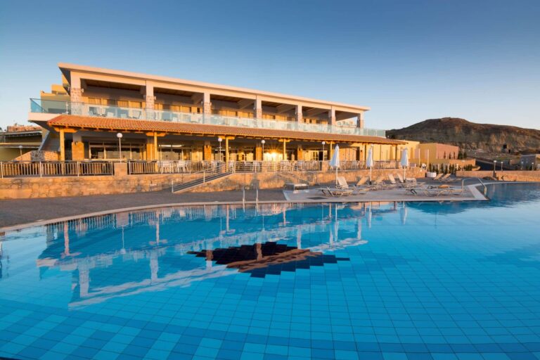 The hotel facade above the pool at sunset, Grand Blue Kos Hotel