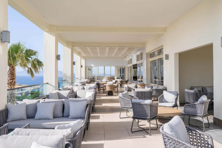 A lounge terrace with sofas and sea views, Grand Blue Kos Hotel