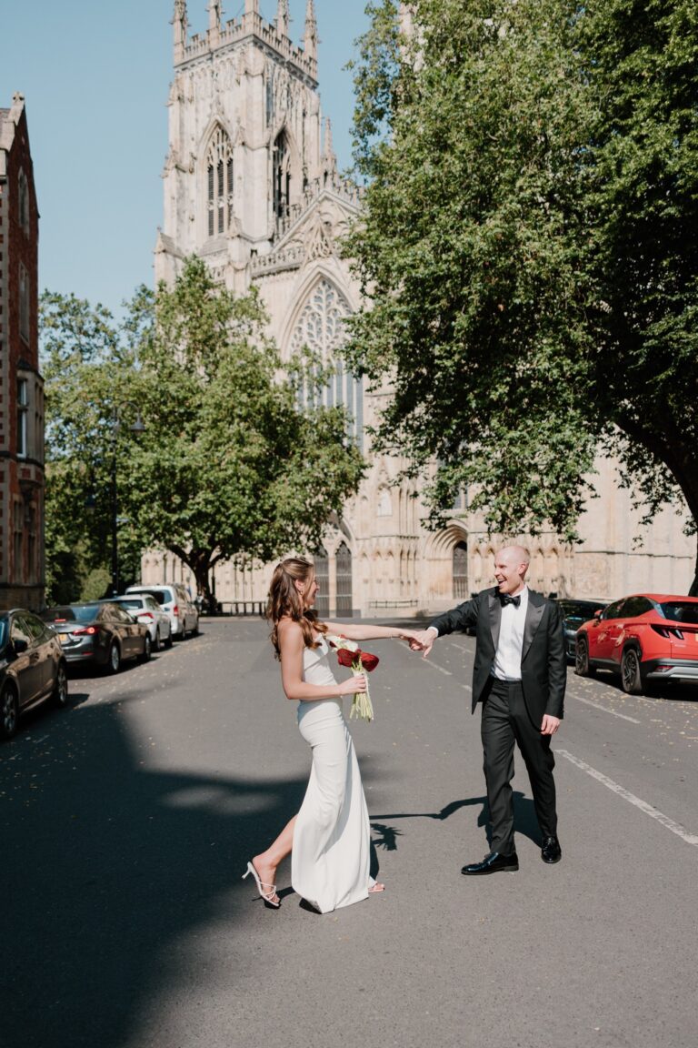 Couple in the street beside York Minster, The Grand Hotel & Spa York