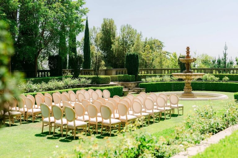 Ceremony chairs set in the Formal Garden, before the fountain, courtesy of One & Only Production, Greystone Mansion