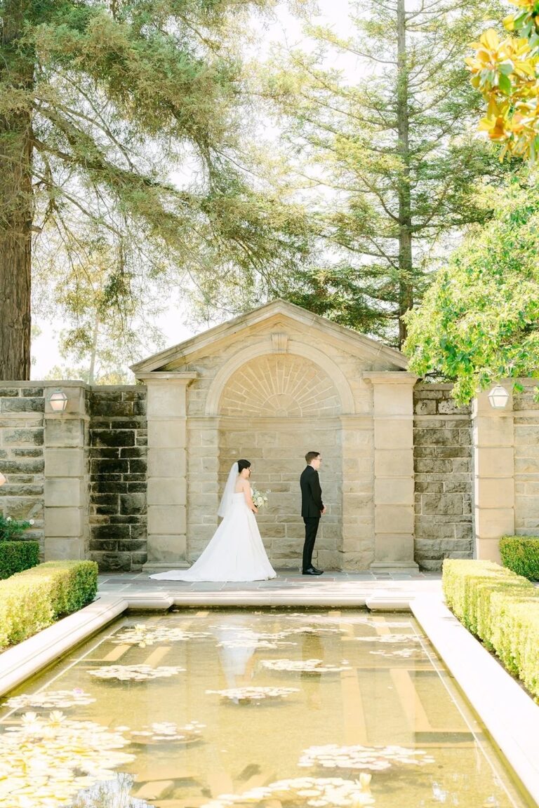 A couple at the reflecting-pool garden wall, courtesy of One & Only Production, Greystone Mansion