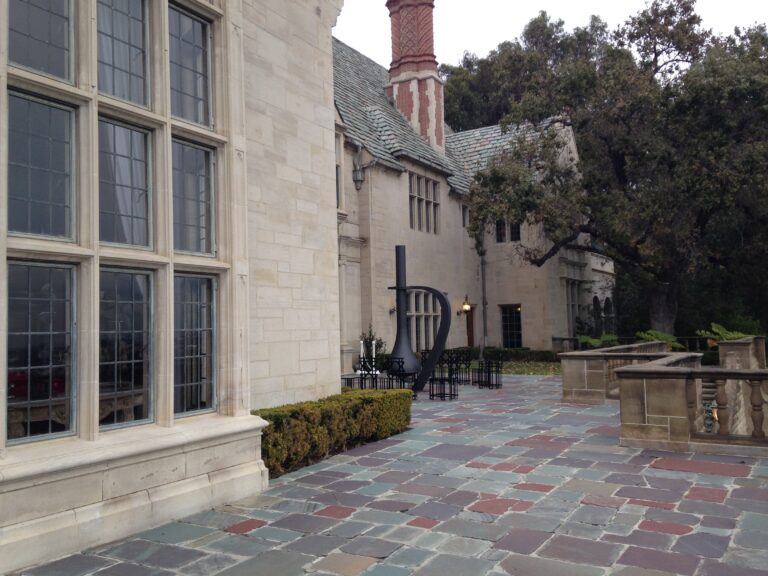 A courtyard terrace, with the Los Angeles skyline beyond, Greystone Mansion