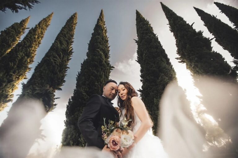 Bride and groom with a garden bouquet, courtesy of Lulan Studio, Greystone Mansion