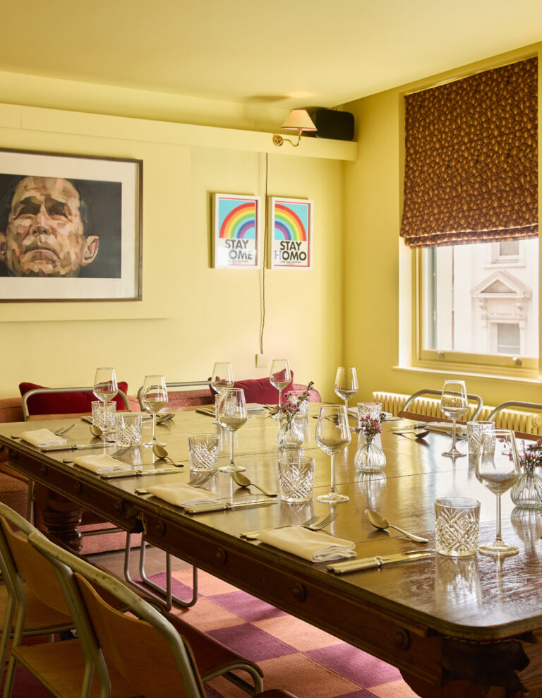 The Groucho Club, A yellow room with a laid table