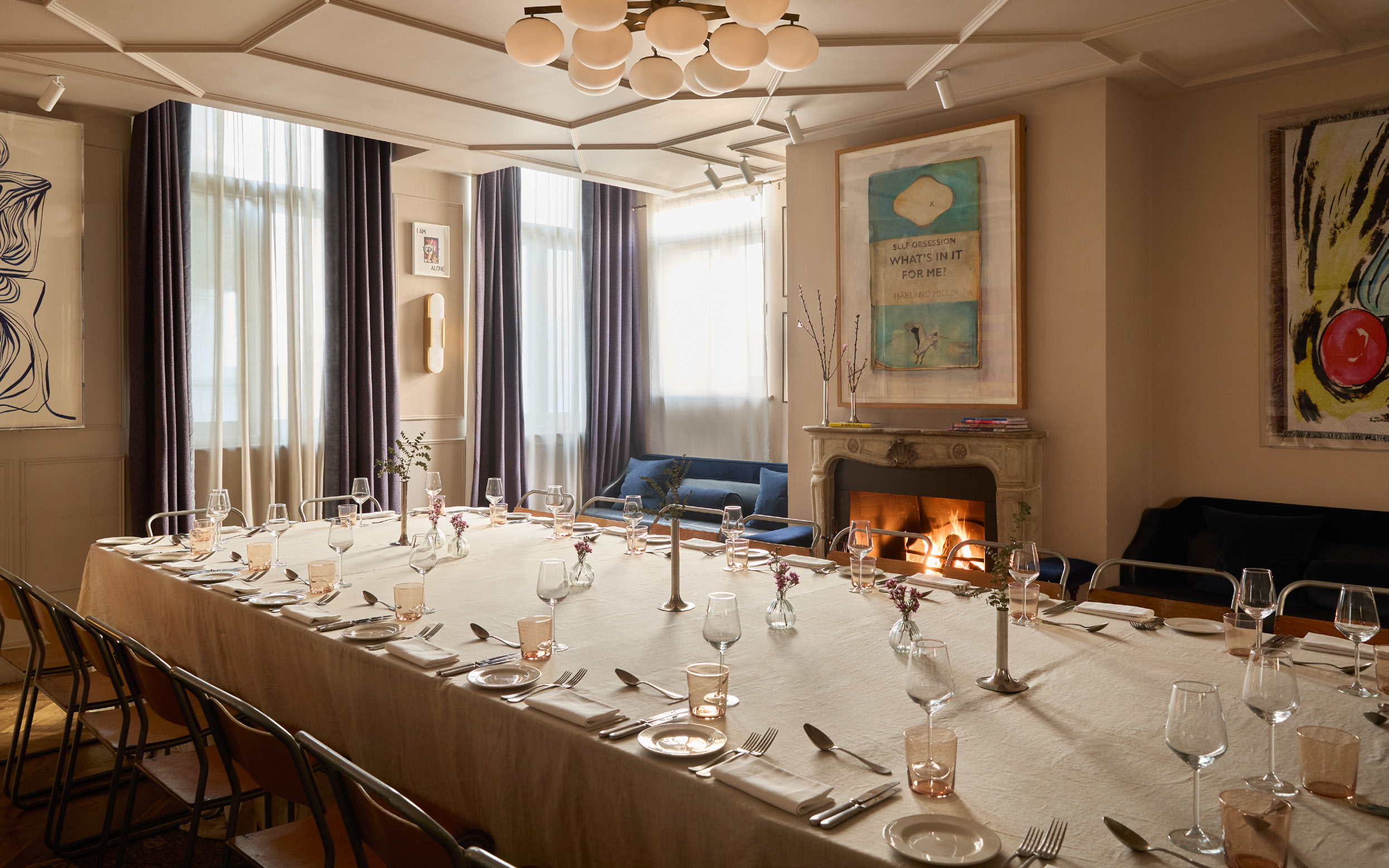 The Groucho Club, The second floor set for a long table dinner by the fireplace