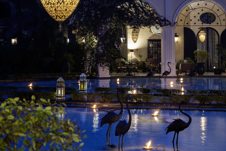 Garden pool lit at night, Hôtel Palais Ronsard Relais & Châteaux
