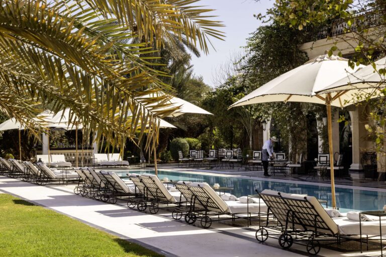 Loungers along the heated outdoor pool, Hôtel Palais Ronsard Relais & Châteaux