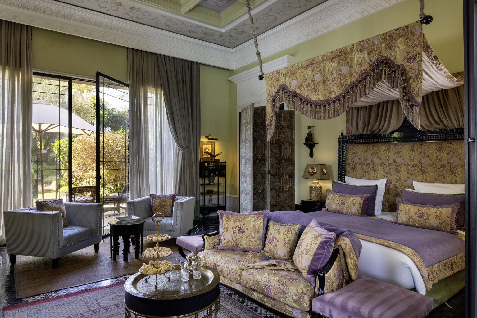 A bedroom with a canopy bed
