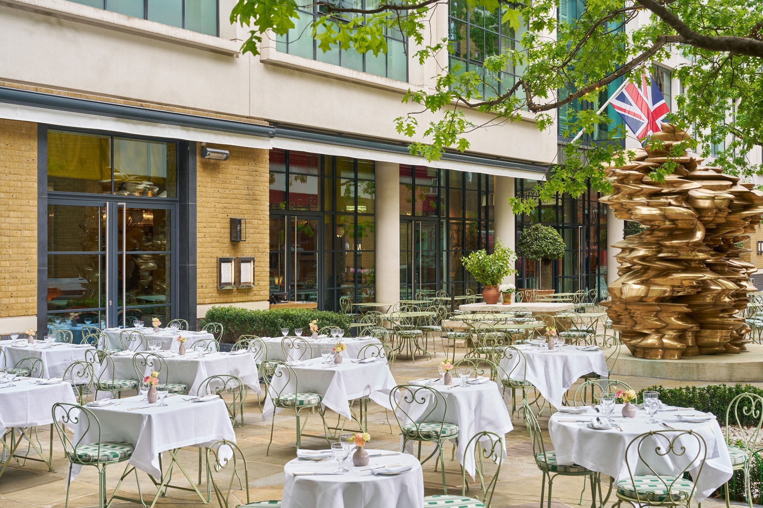 Courtyard terrace dining beside the bronze sculpture, Ham Yard Hotel
