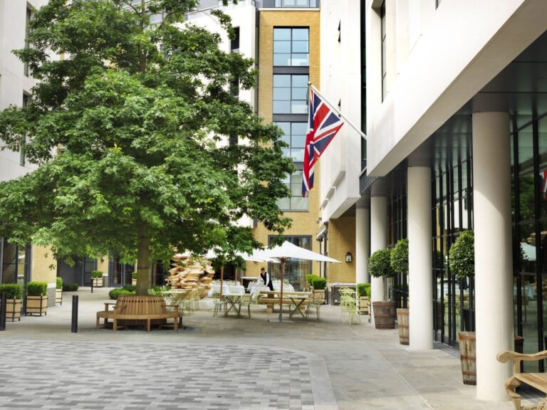Exterior of the hotel on its tree-lined courtyard in Soho, Ham Yard Hotel