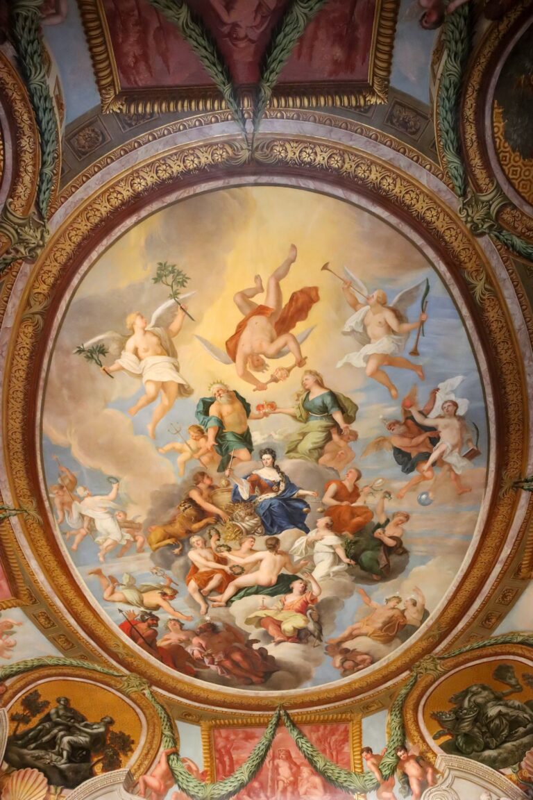 A state-apartment ceiling, an oval mythological fresco framed in gilded plaster, Hampton Court Palace