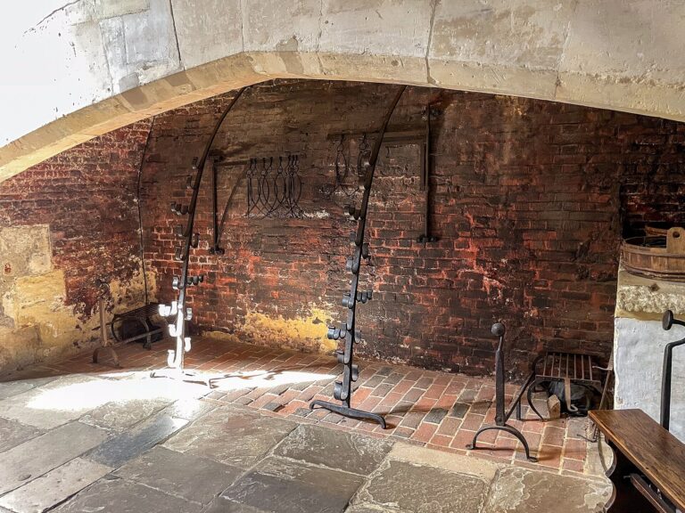 The Great Kitchen's vast brick hearth and open roasting range, Hampton Court Palace