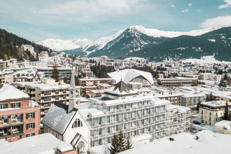 The hotel and Davos under snow, with the Alps beyond, Hard Rock Hotel Davos