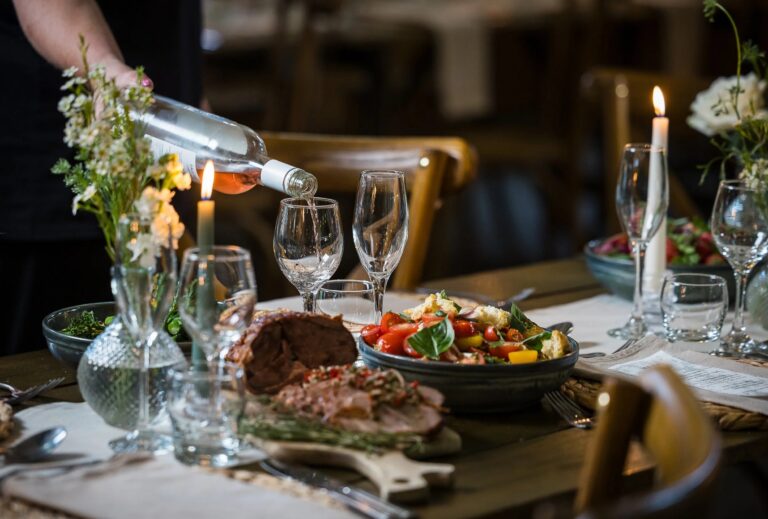A feasting table dressed with food and wine, Haselbury Mill