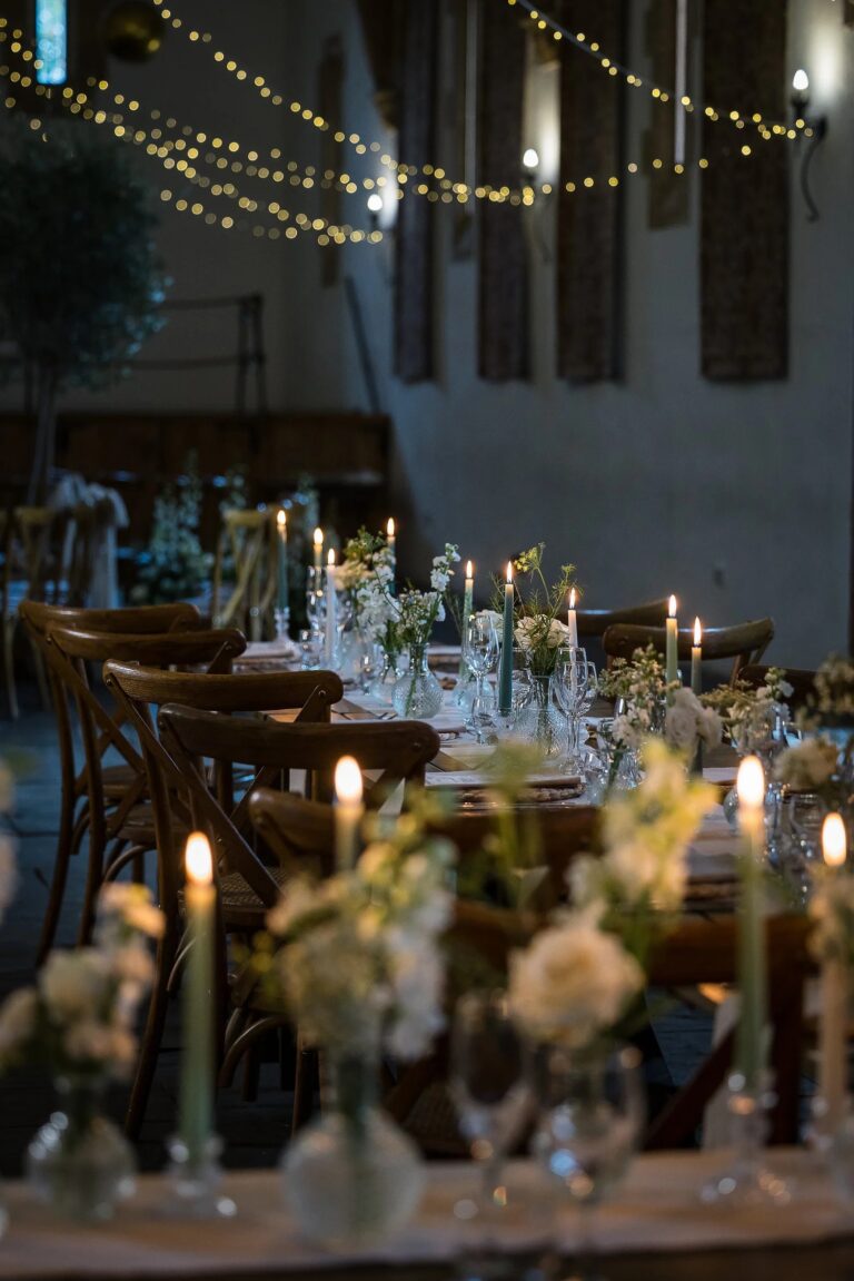A candlelit evening reception under fairy lights, Haselbury Mill