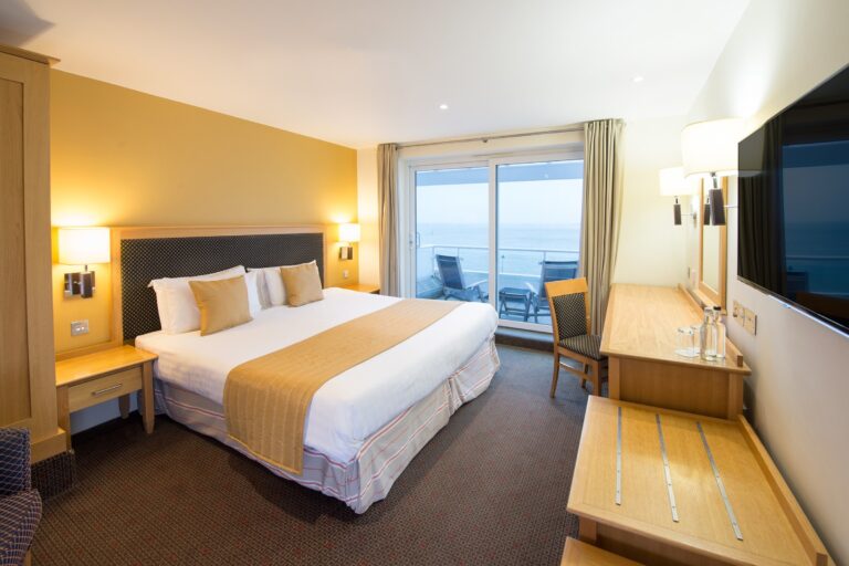 A double bedroom with balcony doors, The Haven Hotel, Poole