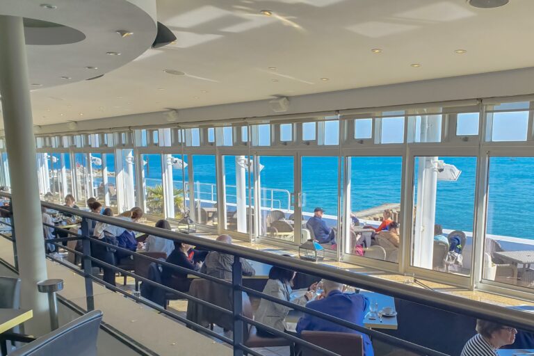 Diners in The Point restaurant above the water, The Haven Hotel, Poole