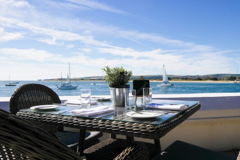 A terrace table set above Poole Bay, The Haven Hotel, Poole