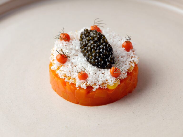 A tartare canapé topped with caviar and cherry tomatoes, Haycock Manor