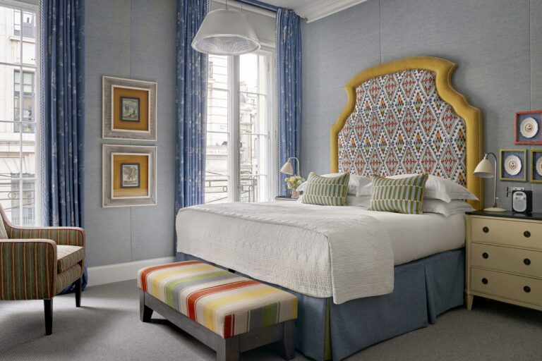 A Deluxe Room, in bold colour and pattern, Haymarket Hotel