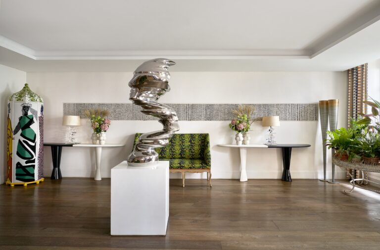 The lobby, dressed with a bold contemporary sculpture, Haymarket Hotel