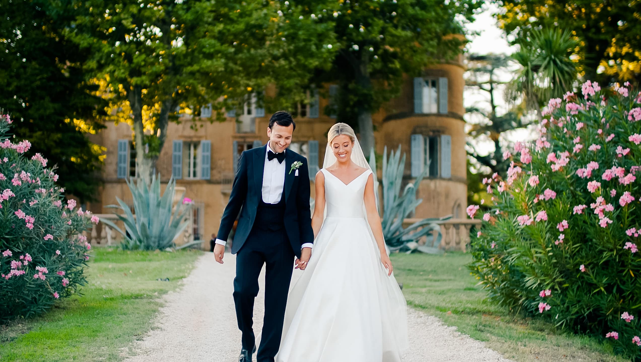 Alexa and Alex walk the oleander-lined drive at Château de Robernier, Provence (film still), HD Moments