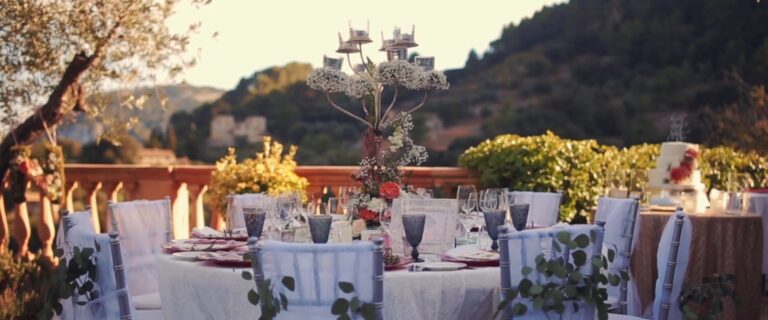Dinner tables laid on the terrace at Valldemossa Hotel, Mallorca, from Steph and Neil's film, HD Moments