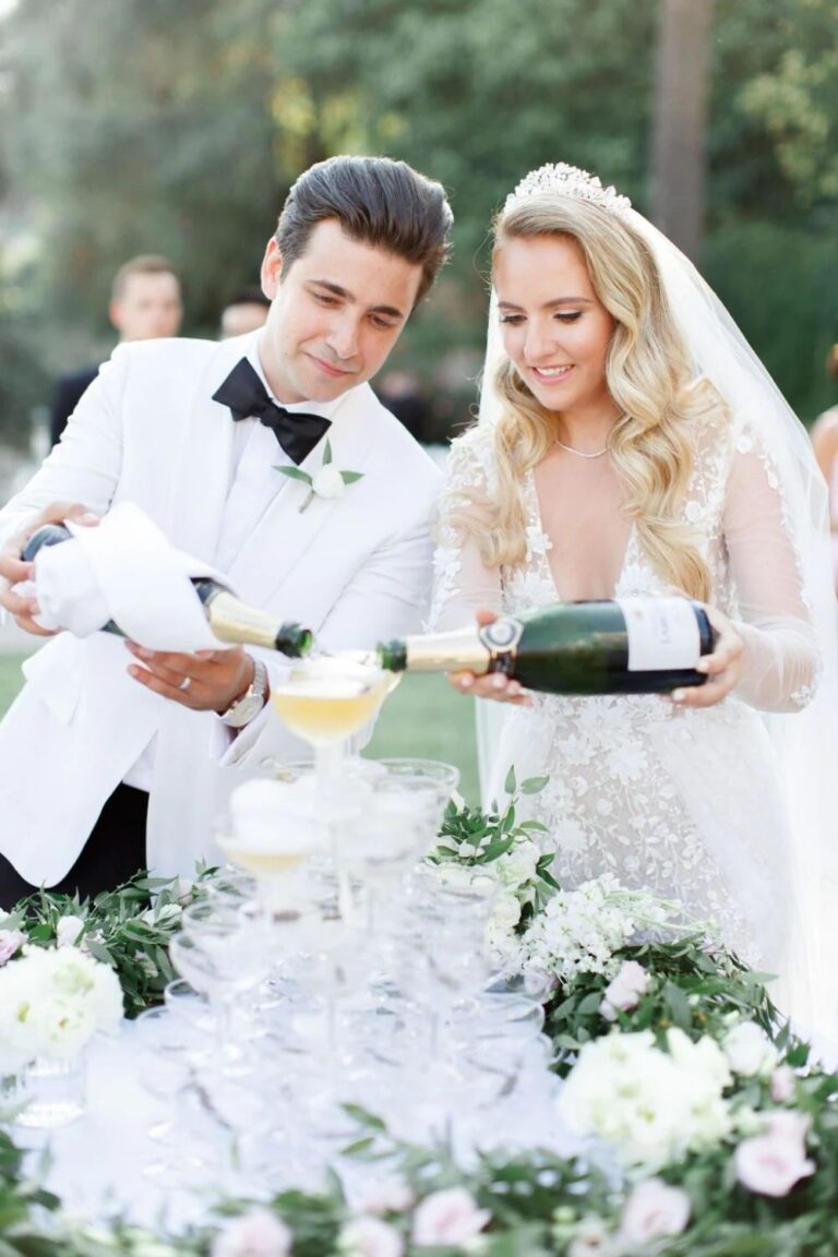 Couple pouring a champagne tower, French Riviera, High Emotion Weddings