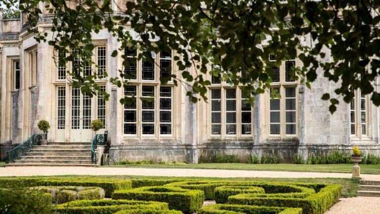 The castle's garden front and clipped parterre, Highcliffe Castle