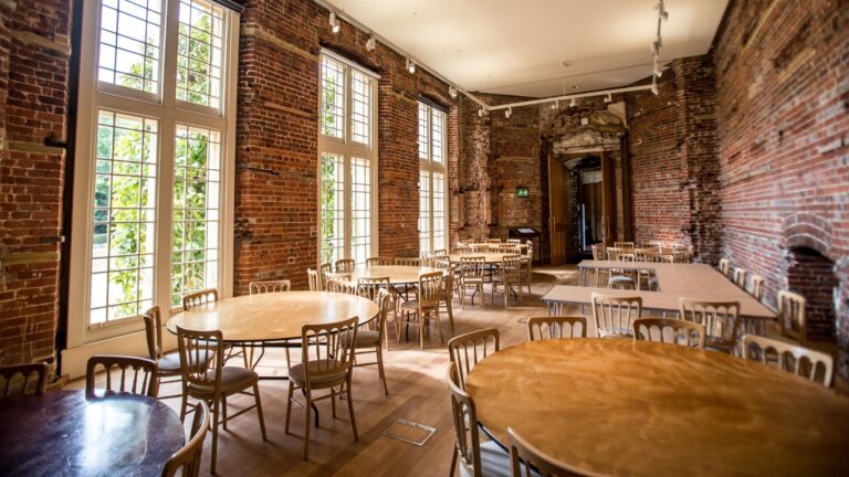 The State Dining Room with exposed brick and stained glass, Highcliffe Castle