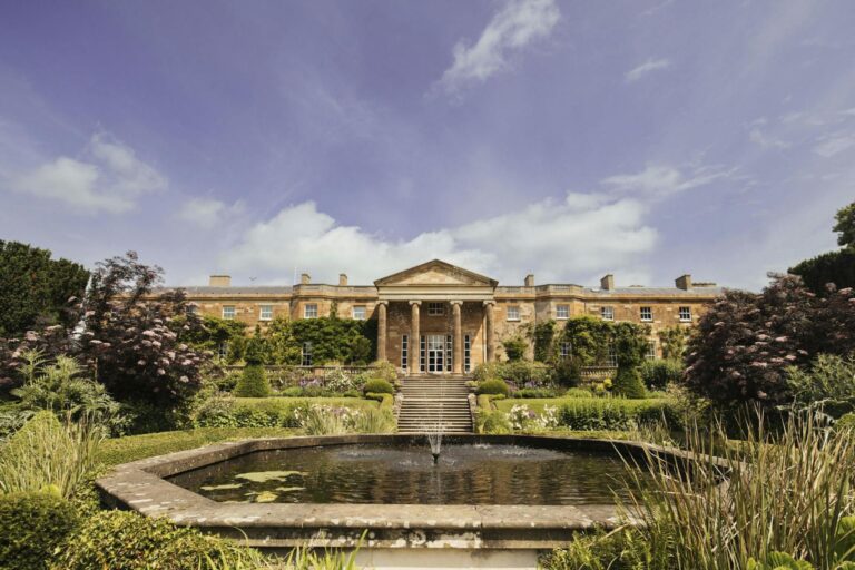 The Georgian castle mirrored in the formal garden pool, Hillsborough Castle and Gardens
