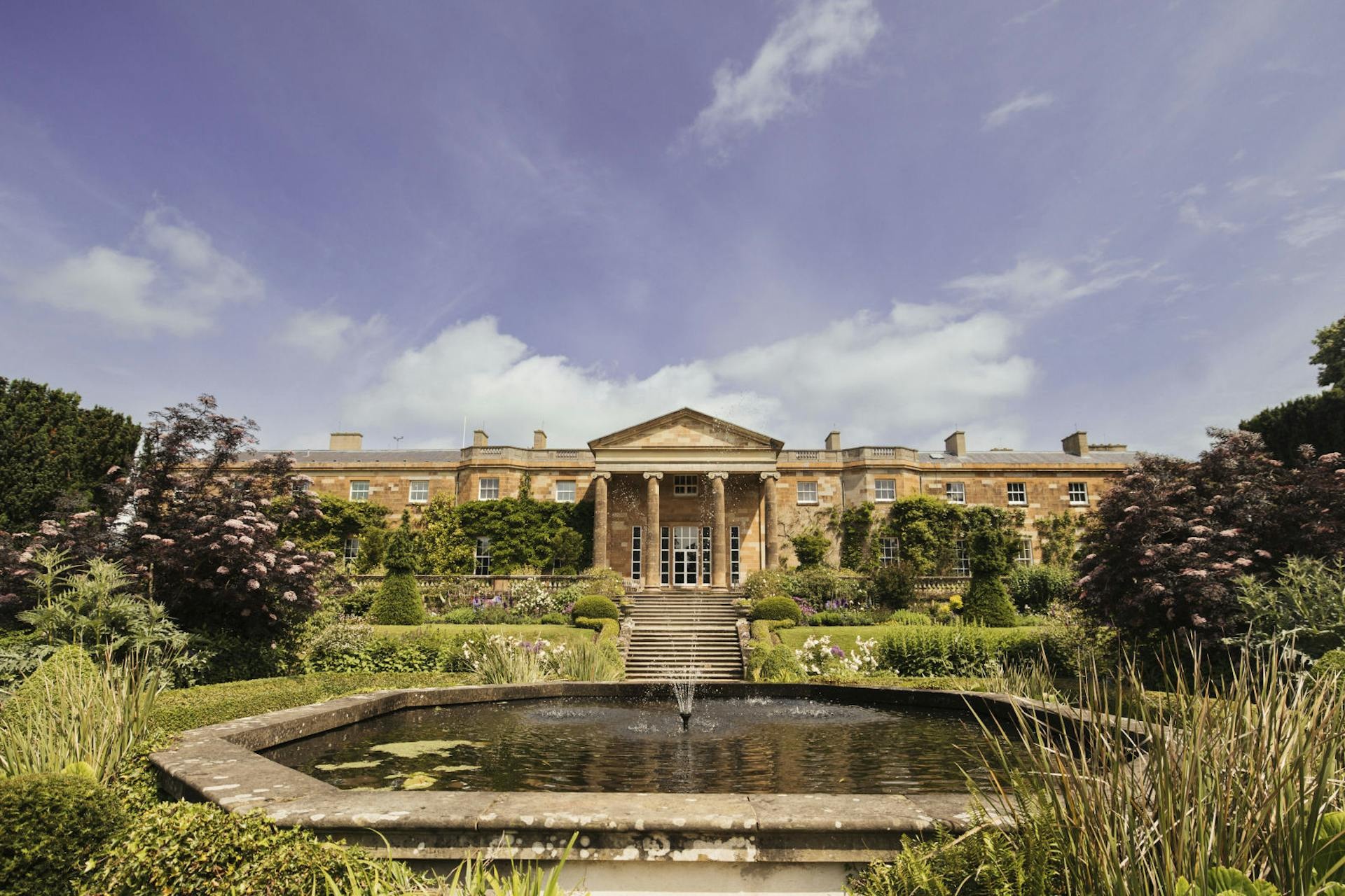 The Georgian castle mirrored in the formal garden pool, Hillsborough Castle and Gardens